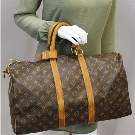 lv leathwr duffel bag|louis vuitton duffle bag women's.